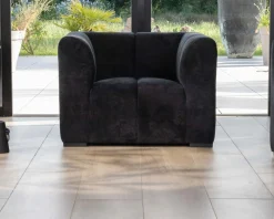 Online Fauteuil design cubique en velours anthracite avec surpiqures