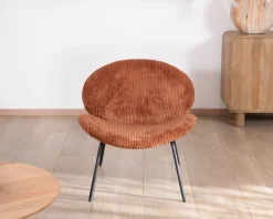 Fauteuil lounge design en velours côtelé rouille