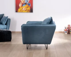Sale Grand fauteuil cosy en tissu bleu et pieds en métal noir